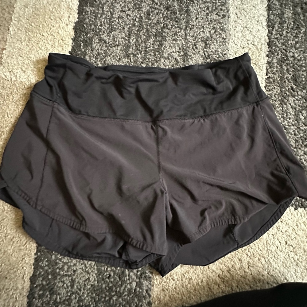 Black LULULEMON 4” short. Size 12